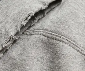 Raw edge grinding distressing
