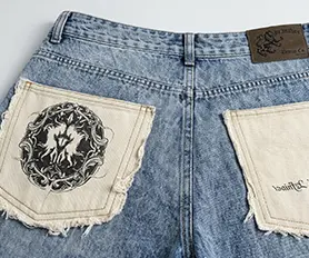 Raw-edge patch pockets, embossed leather patches